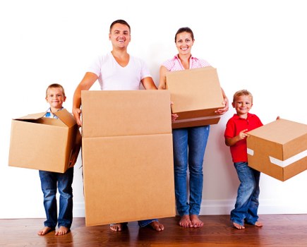 Man And Van Camdentown service moving boxes in a local residential area