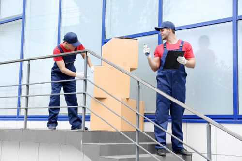 Removal team planning a move in a Camdentown street with tight access