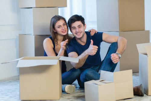 Moving team handling household furniture in Camdentown